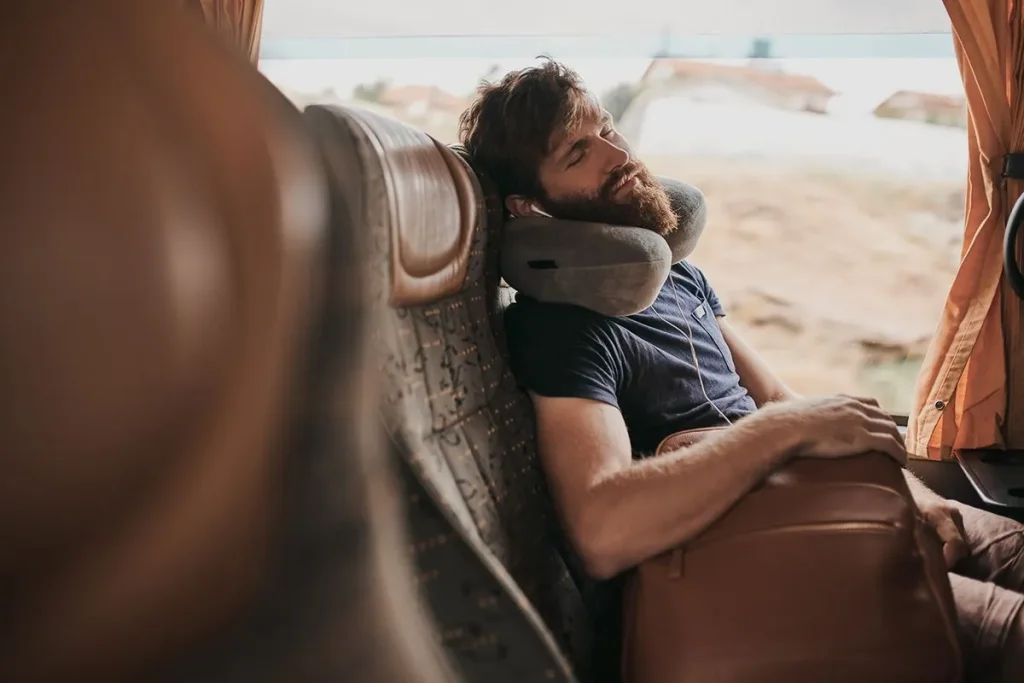 how to wear a travel pillow